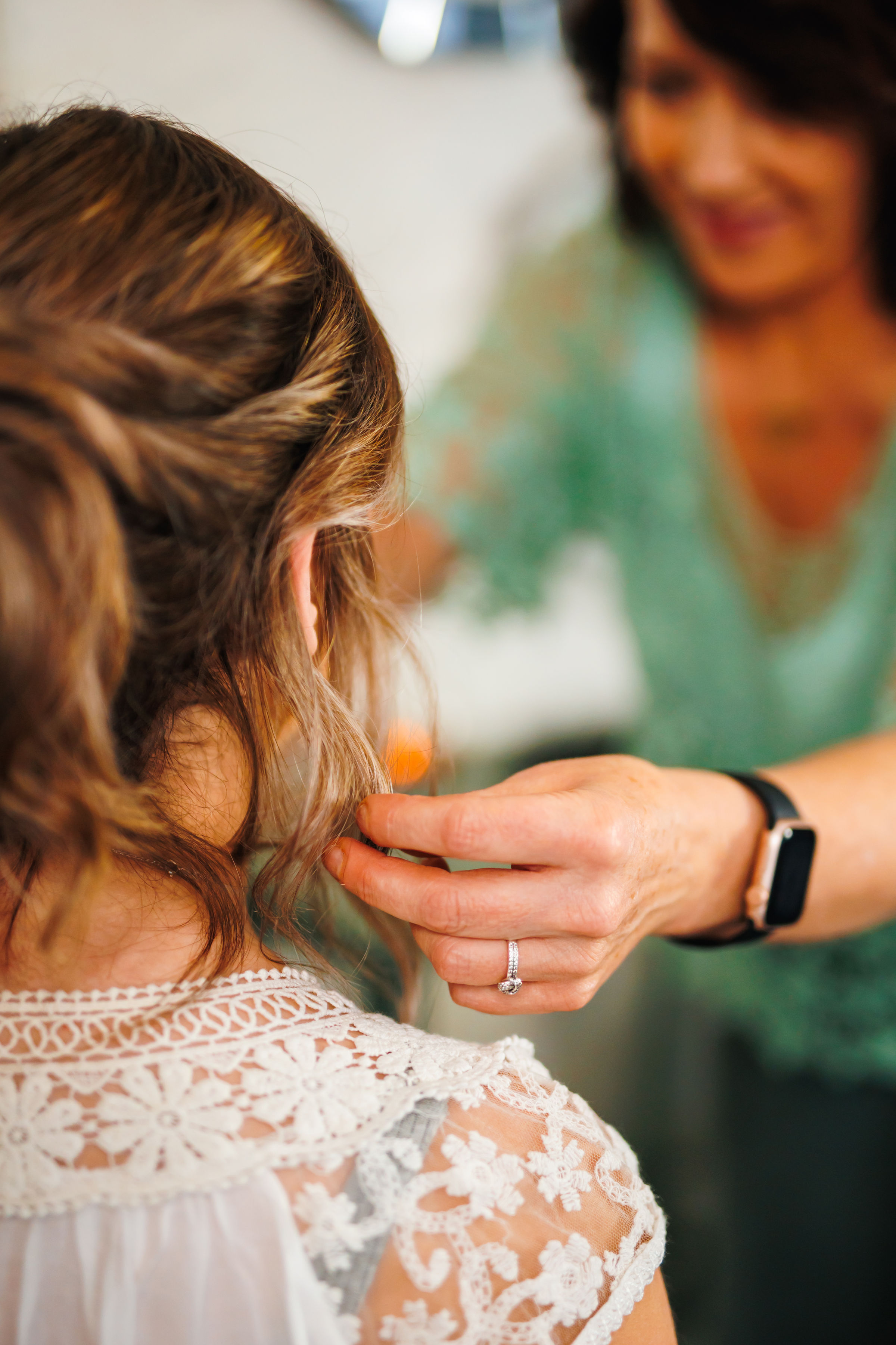 Close up photo of a hairdresser's hand doing hair