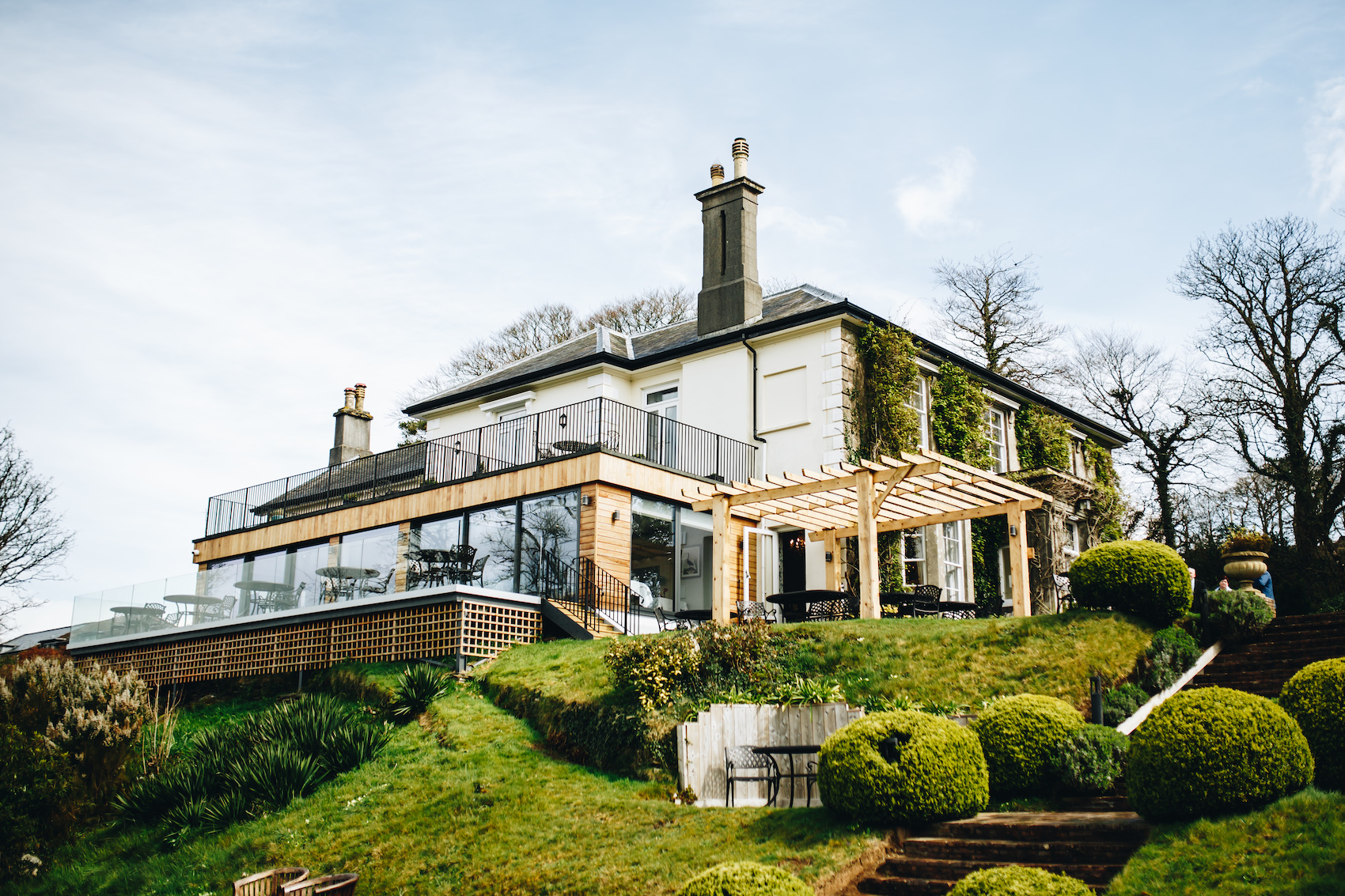 Photo from the gardens below of the Horn of Plenty, with its greenery and balconies looking lovely