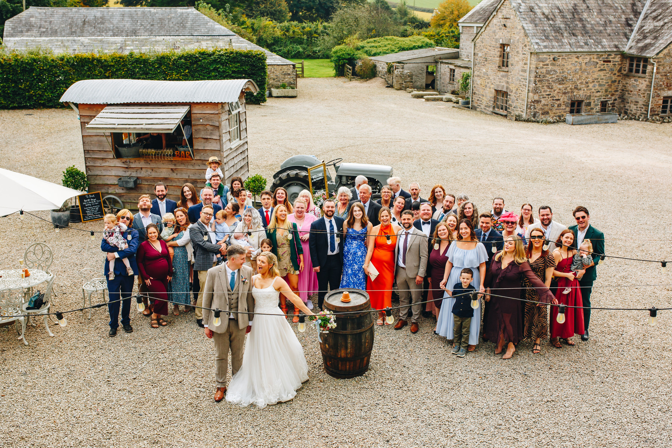 Group photo in rustic courtyard