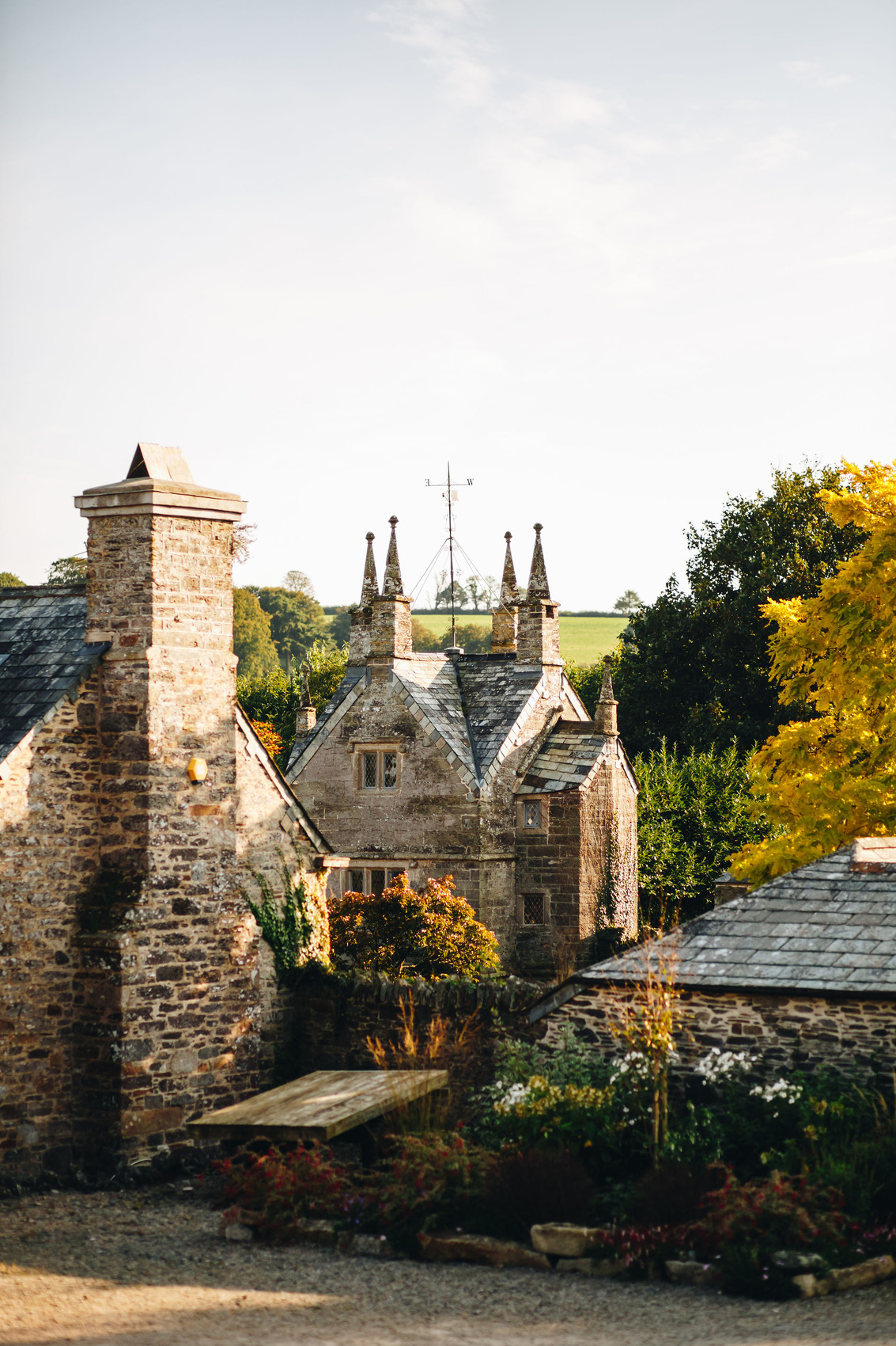 Bradstone Manor building lit by early evening sun