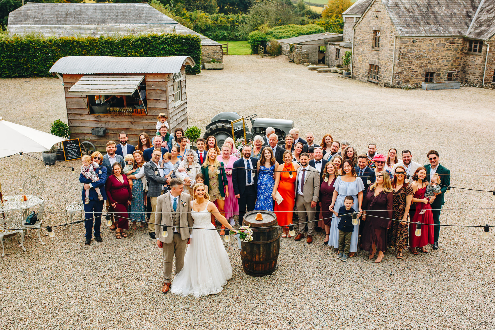 Group photo in a courtyard at Bradstone Manor Weddings