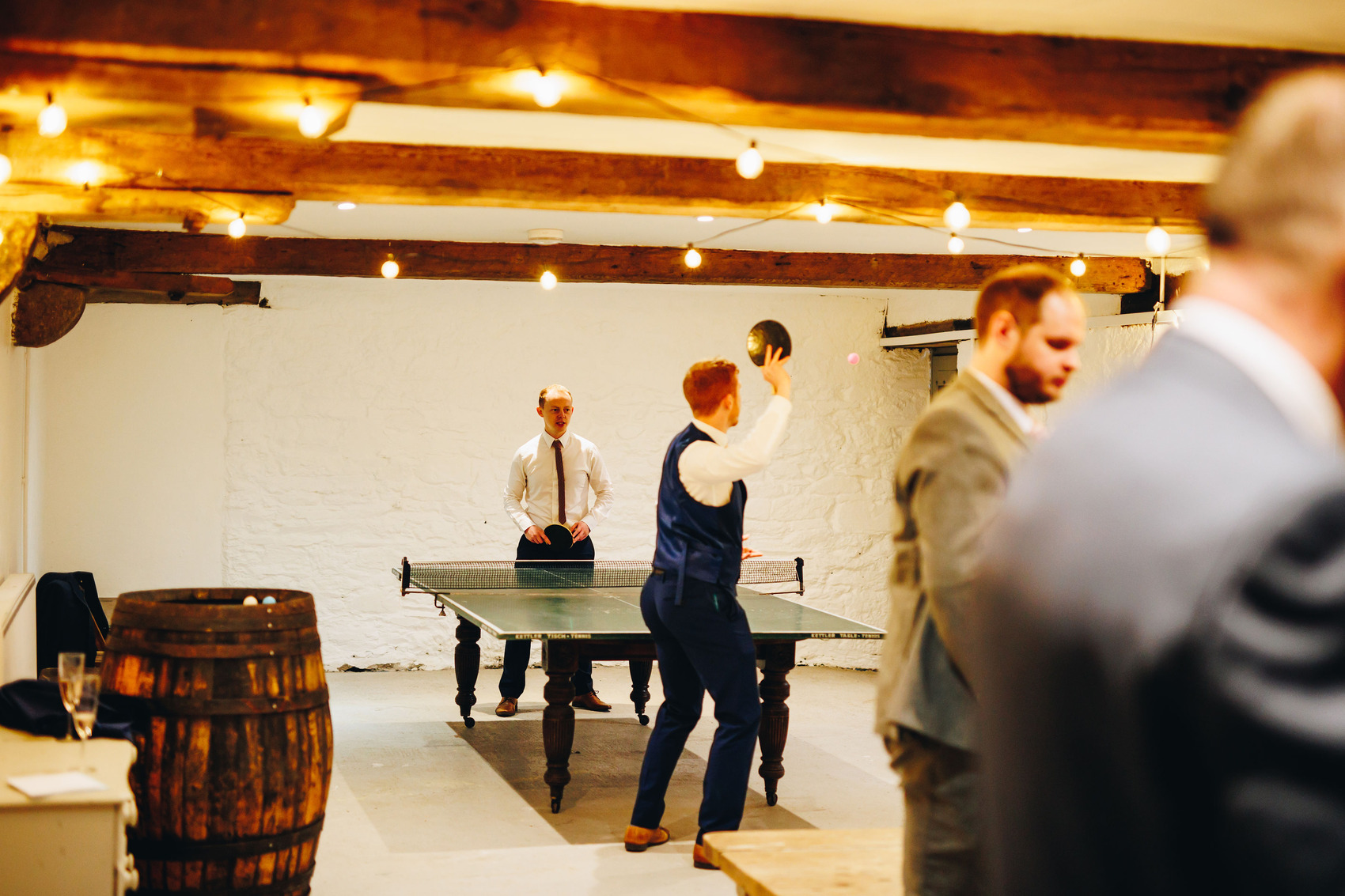 Wedding guests playing table tennis