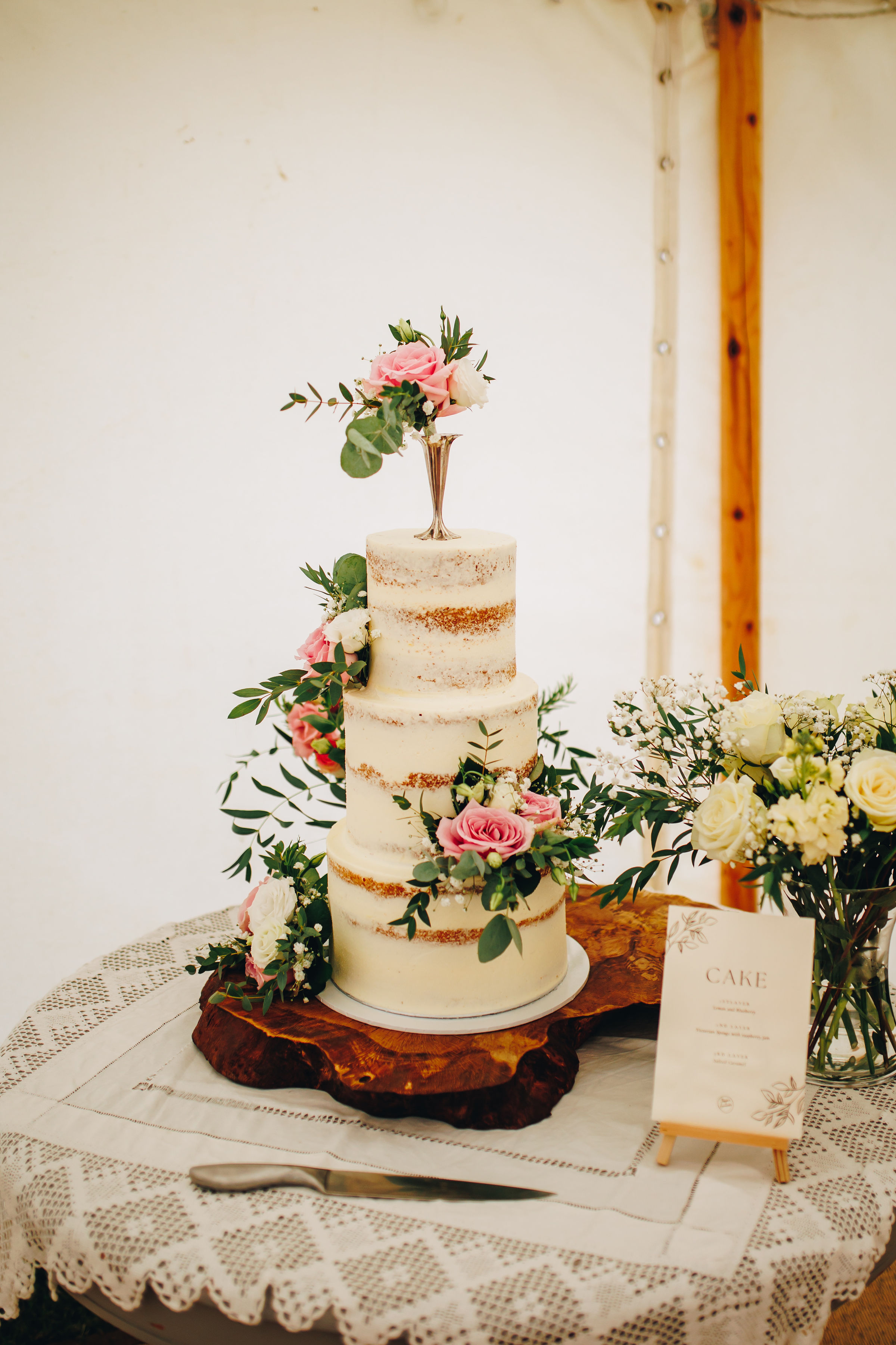 3-tiered wedding cake with flowers