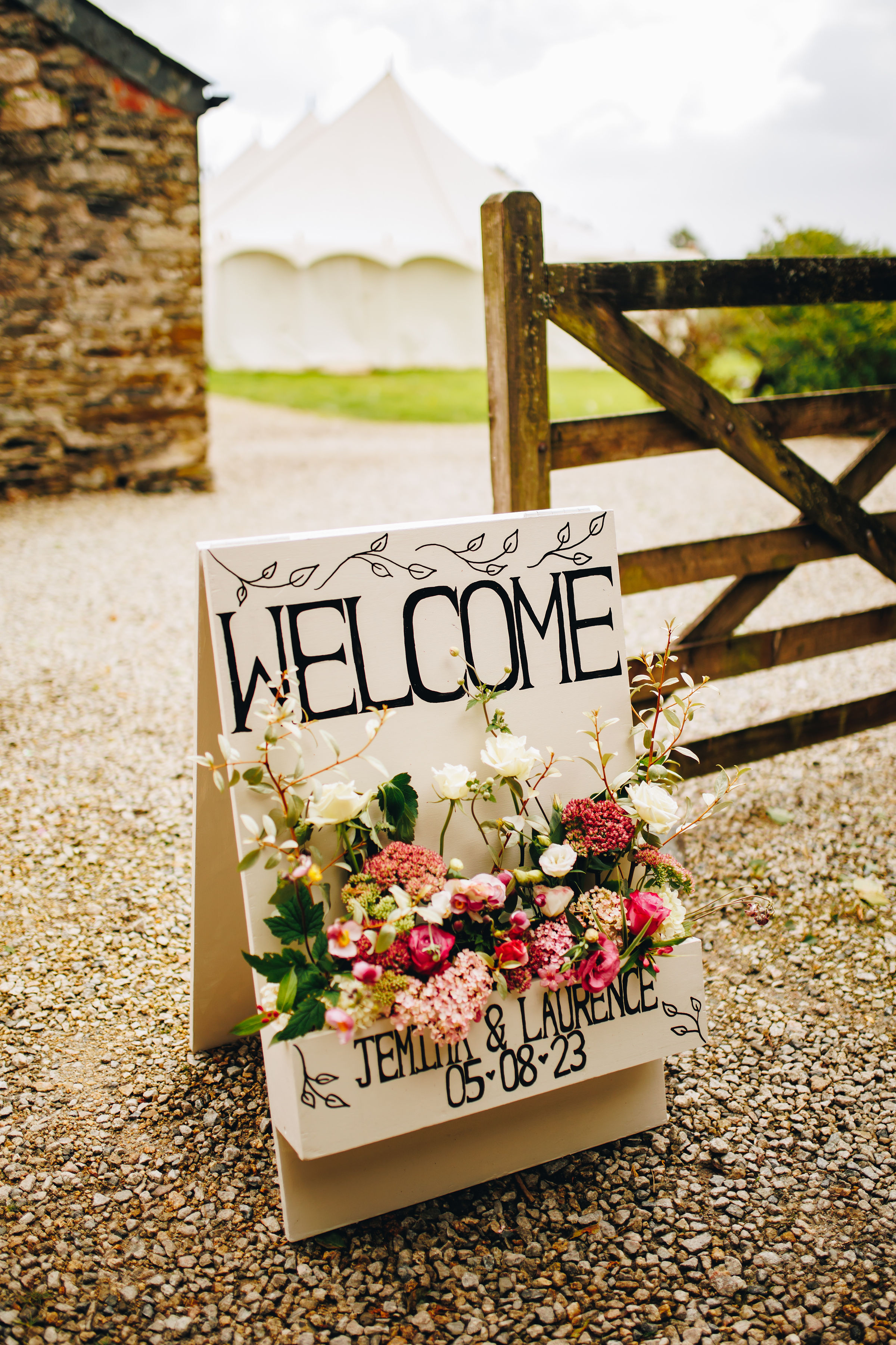 Floral entrance sign