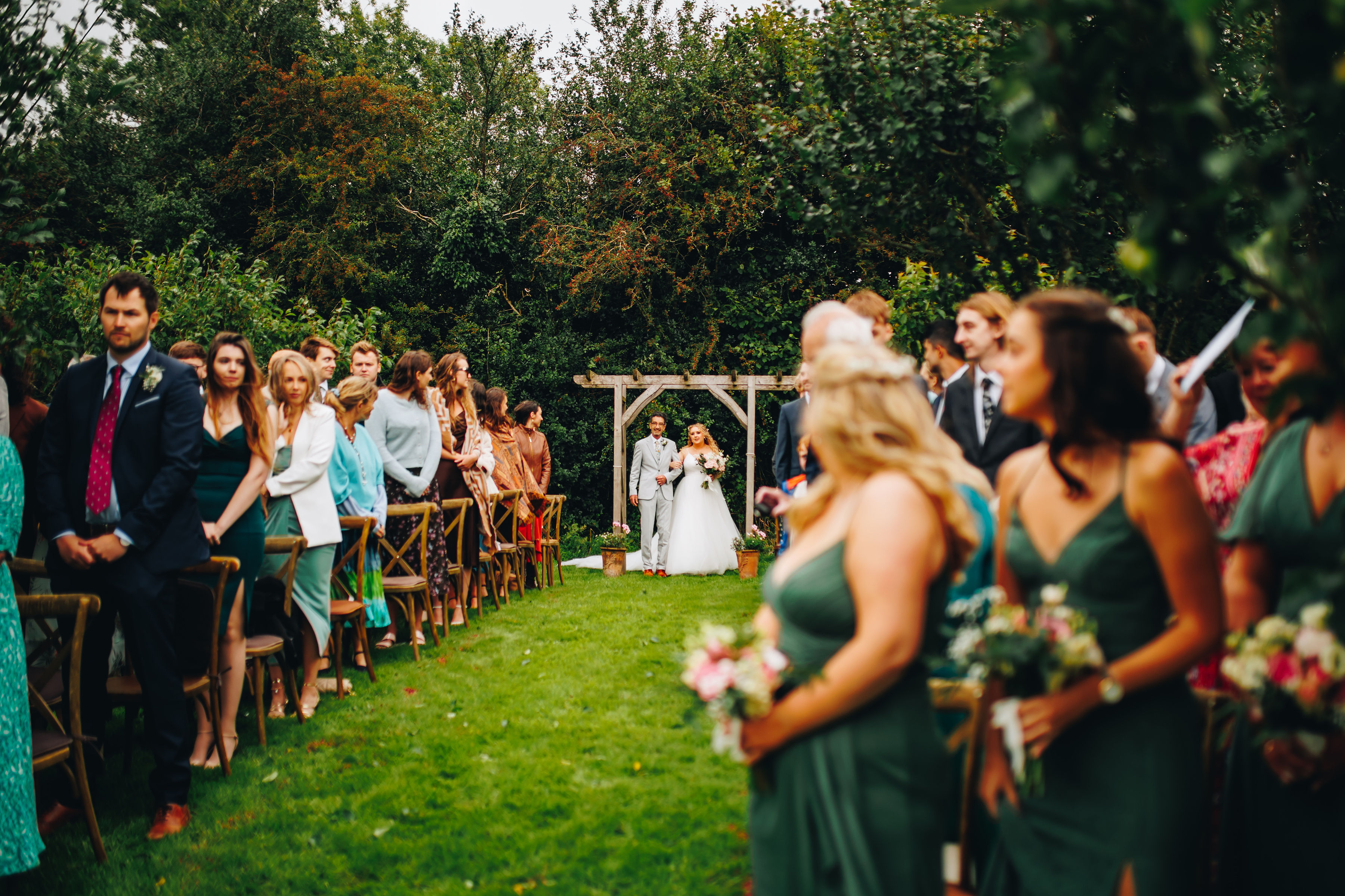 Bride and dad about to walk up the aisle at her wedding