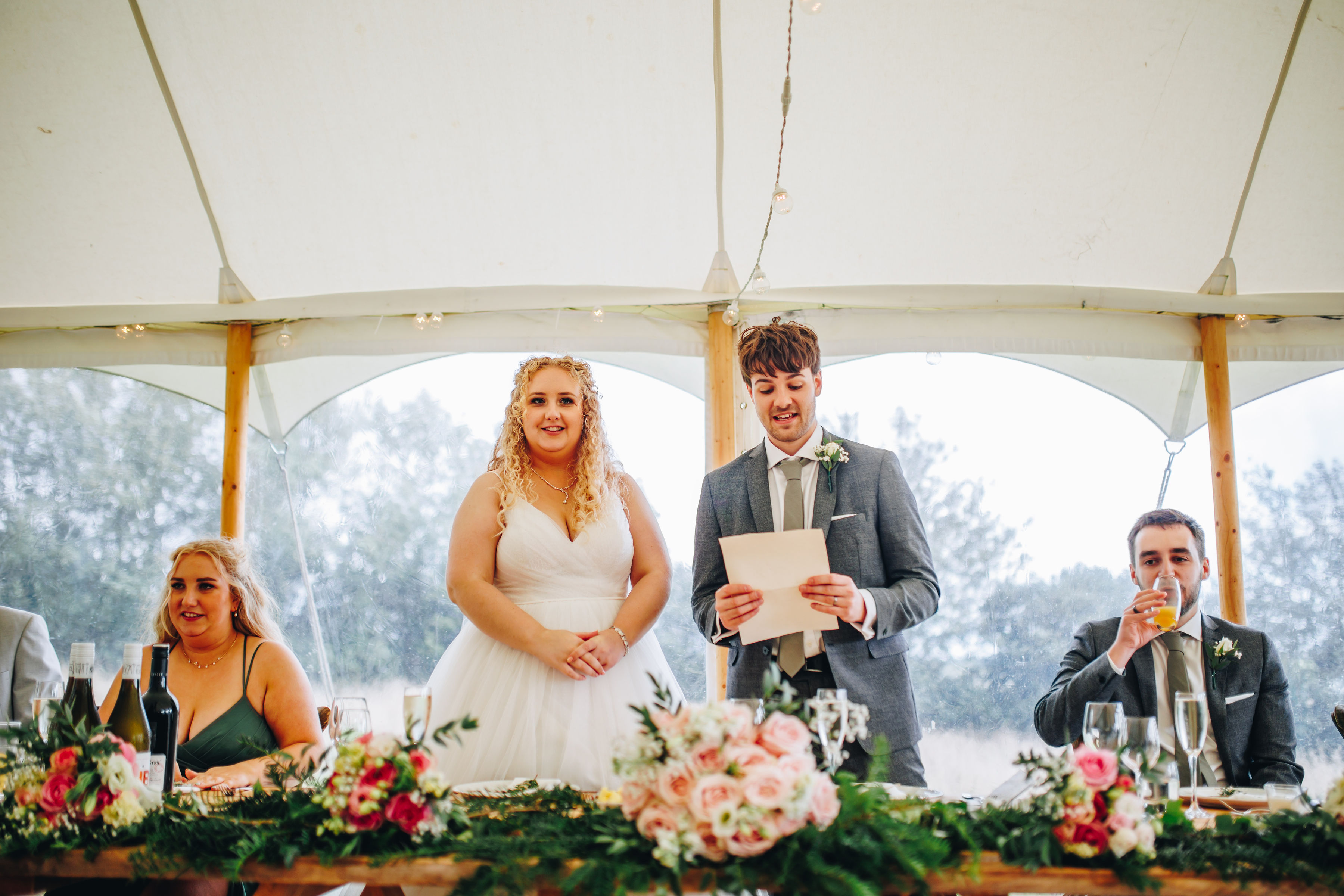 Bride and groom give a speech
