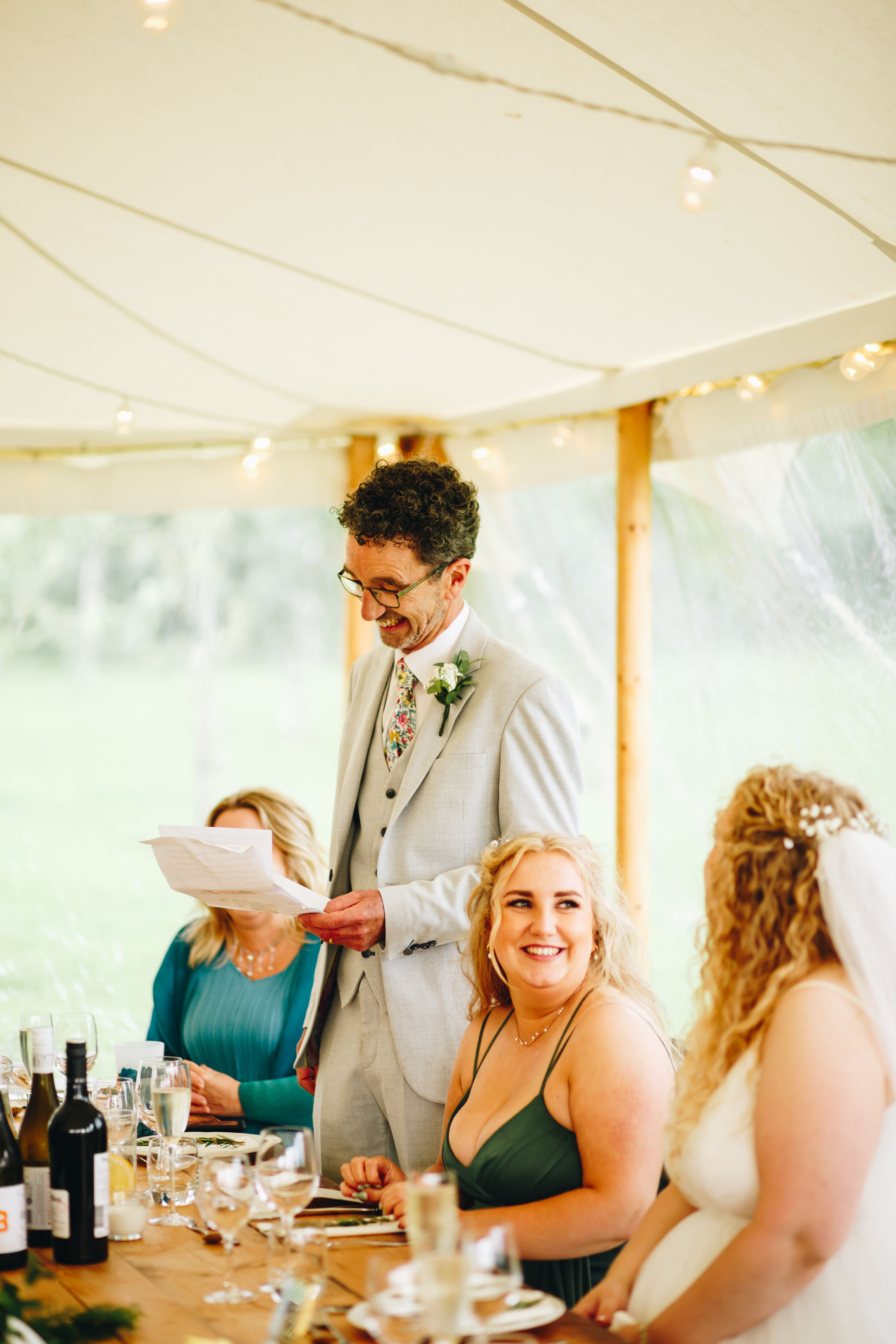 Dad giving a speech at his daughter's wedding