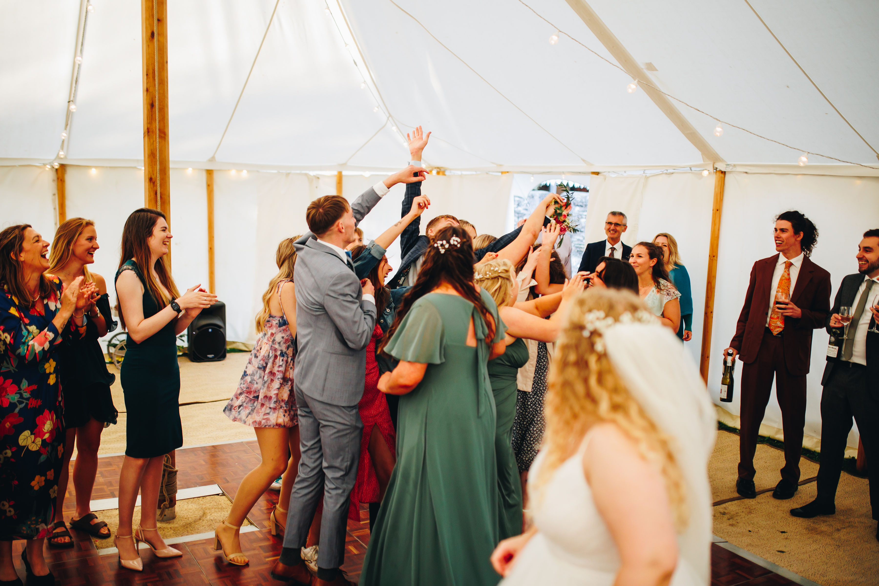 Bouquet toss - cousin caught it and celebrating