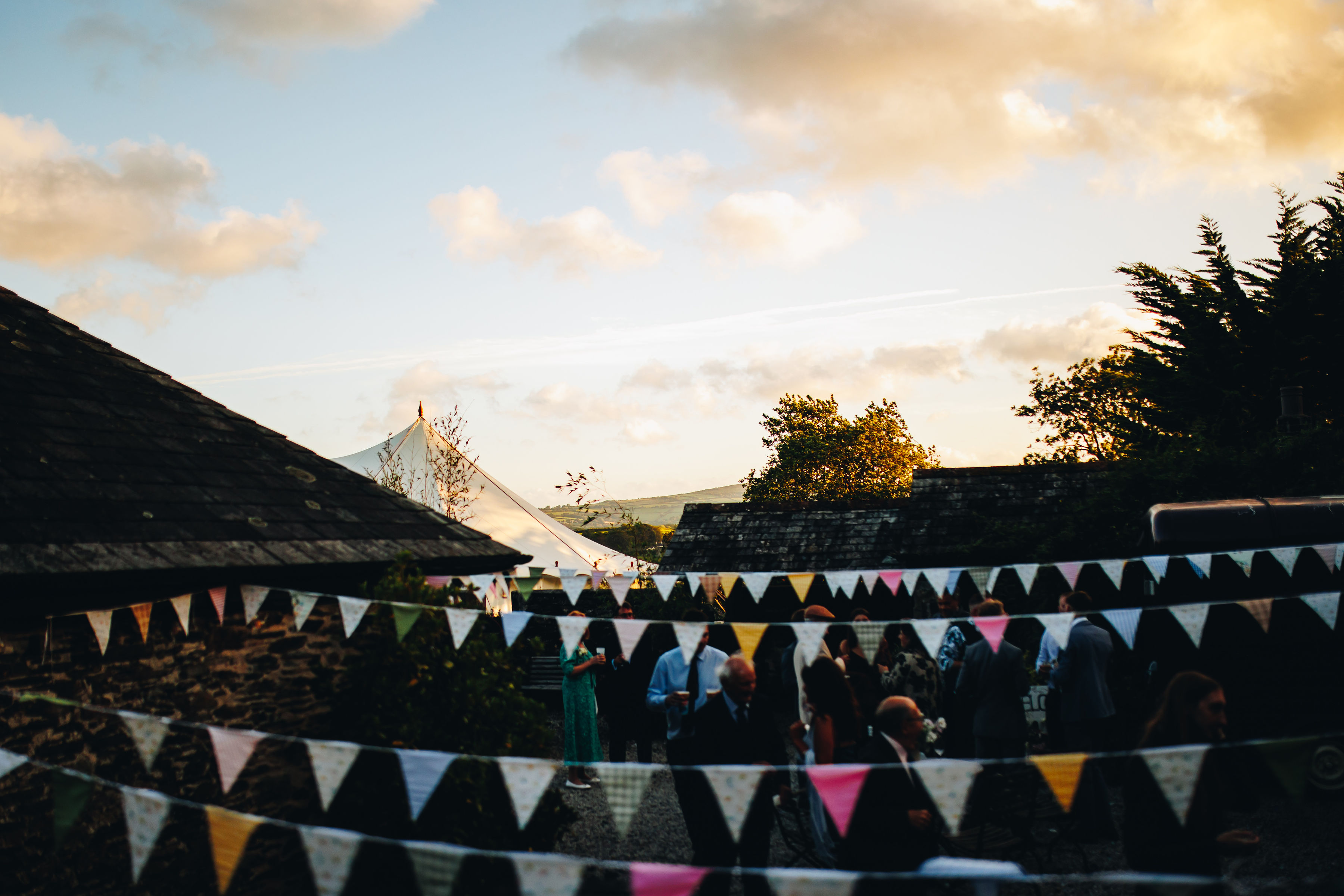 Marquee at sunset, with bunting in the foreground