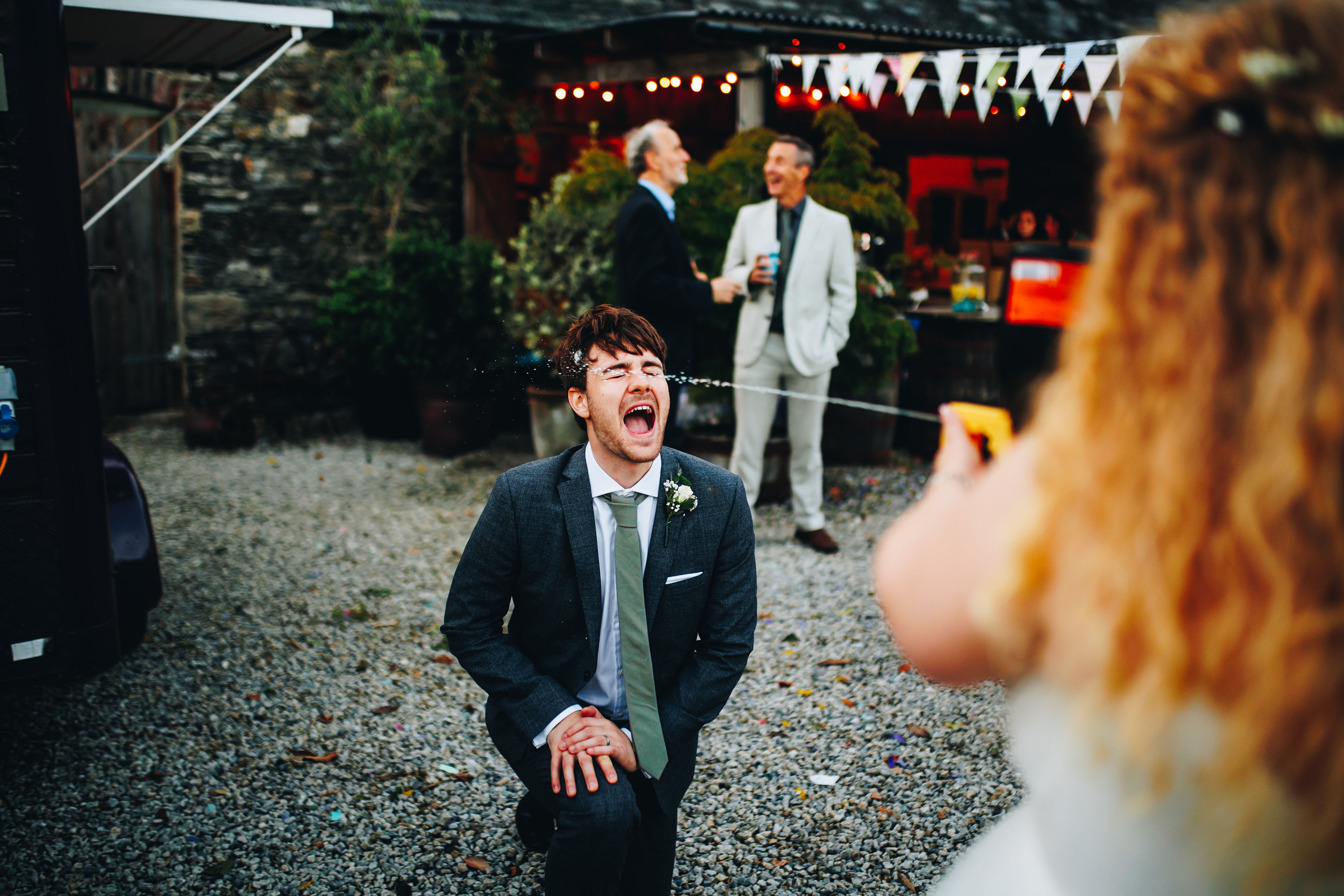Bride using Prosecco gun