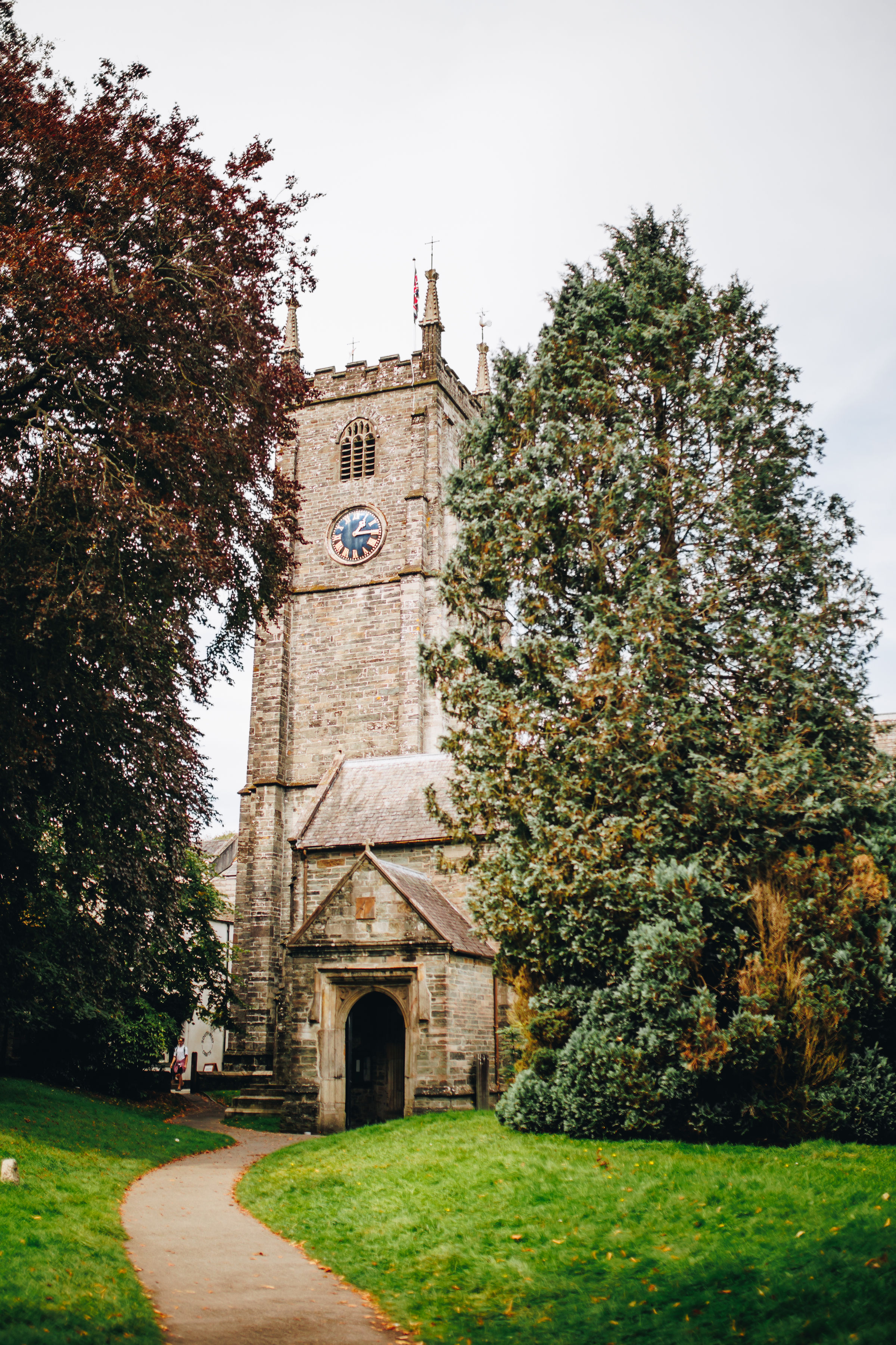 Tavistock St Eustachius Church, with path and trees