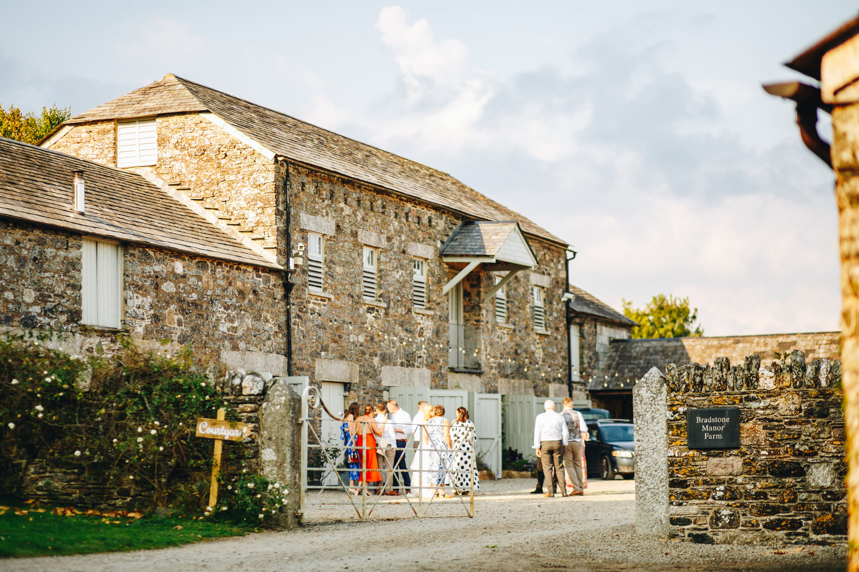 Guests in the Bradstone Manor courtyard