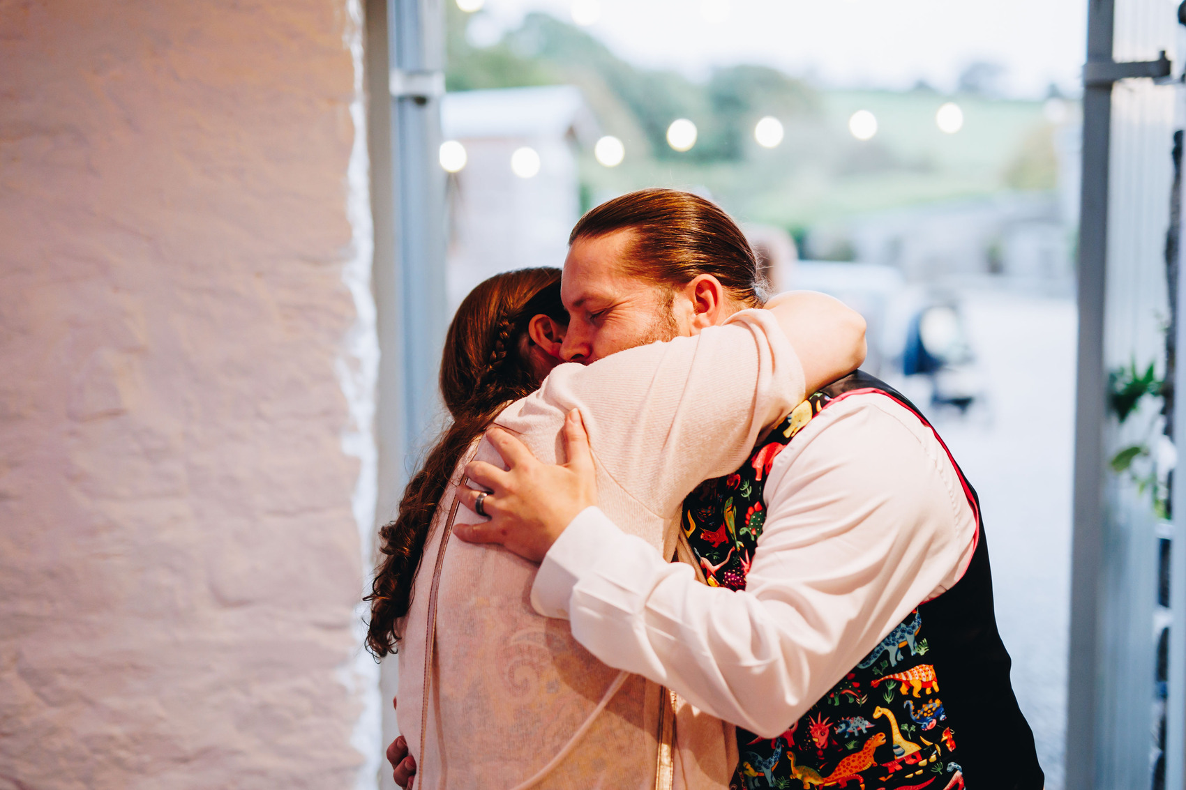 Guests hugging on the dancefloor