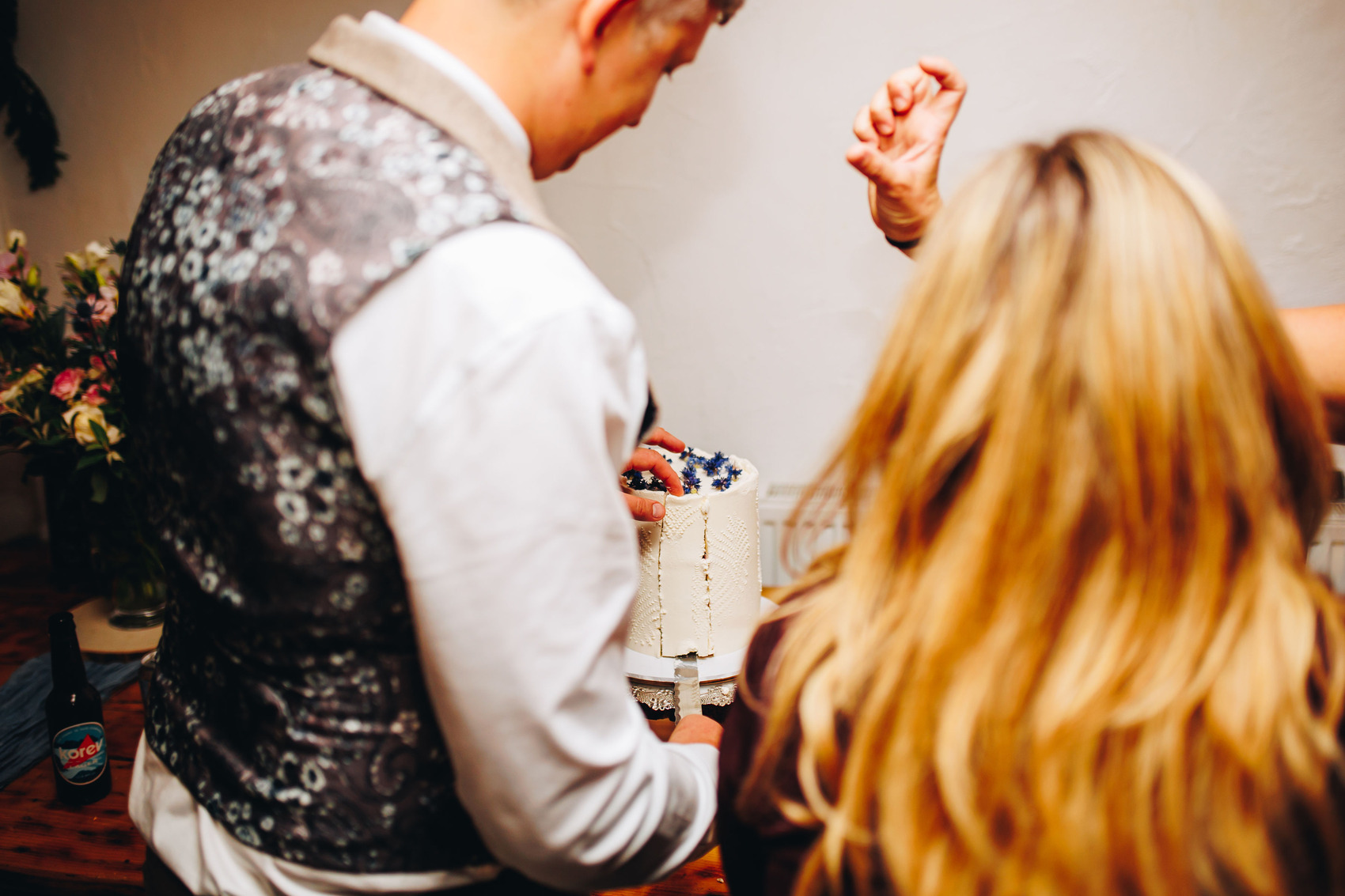 Wedding cake being cut and served